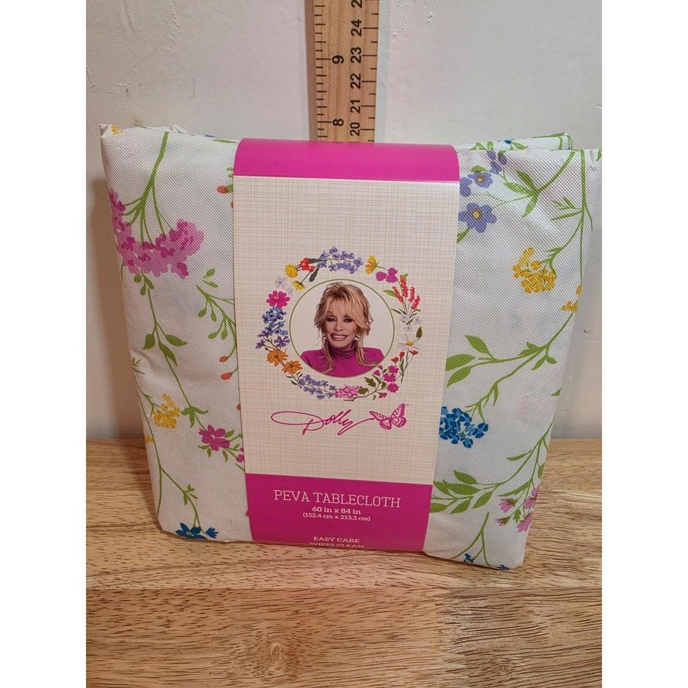 Dolly Parton Spring PEVA tablecloth featuring a white background flowers